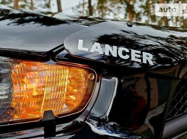 Чорний Міцубісі Лансер Х, об'ємом двигуна 2 л та пробігом 48 тис. км за 9670 $, фото 41 на Automoto.ua