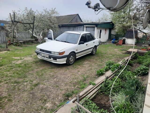 Білий Міцубісі Lancer, об'ємом двигуна 0 л та пробігом 400 тис. км за 996 $, фото 2 на Automoto.ua