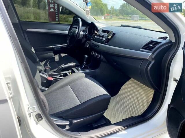 Білий Міцубісі Lancer, об'ємом двигуна 1.8 л та пробігом 238 тис. км за 6000 $, фото 11 на Automoto.ua