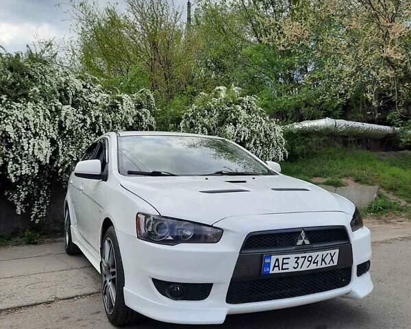 Белый Мицубиси Лансер, объемом двигателя 1.8 л и пробегом 177 тыс. км за 9700 $, фото 1 на Automoto.ua