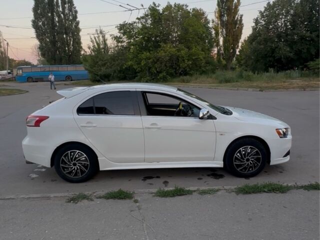 Белый Мицубиси Лансер, объемом двигателя 1.8 л и пробегом 230 тыс. км за 6506 $, фото 2 на Automoto.ua