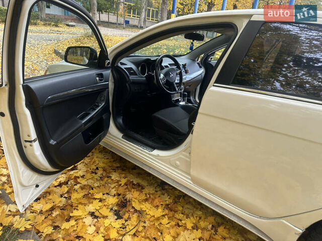 Мицубиси Лансер 2008 в Харькове на Automoto.ua Белый Мицубиси Лансер, объемом двигателя 1.8 л и пробегом 205 тыс. км за 6500 $, фото 12 на Automoto.ua