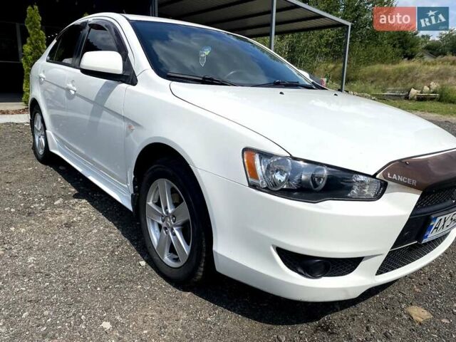 Білий Міцубісі Lancer, об'ємом двигуна 1.8 л та пробігом 238 тис. км за 6000 $, фото 3 на Automoto.ua