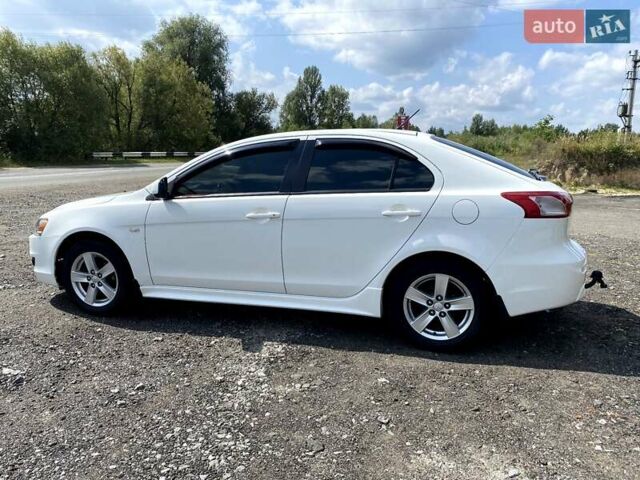 Білий Міцубісі Lancer, об'ємом двигуна 1.8 л та пробігом 238 тис. км за 6000 $, фото 6 на Automoto.ua