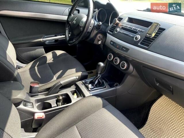 Білий Міцубісі Lancer, об'ємом двигуна 1.8 л та пробігом 238 тис. км за 6000 $, фото 10 на Automoto.ua