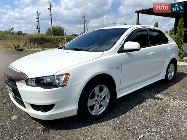 Білий Міцубісі Lancer, об'ємом двигуна 1.8 л та пробігом 238 тис. км за 6000 $, фото 1 на Automoto.ua