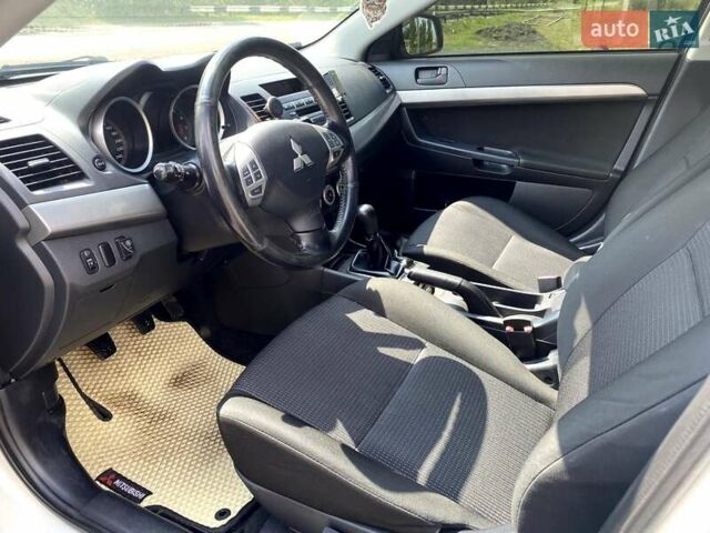 Білий Міцубісі Lancer, об'ємом двигуна 1.8 л та пробігом 238 тис. км за 6000 $, фото 8 на Automoto.ua