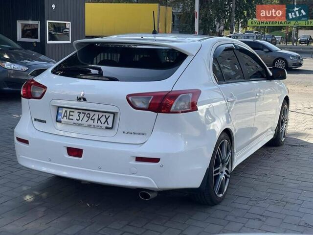 Белый Мицубиси Лансер, объемом двигателя 1.8 л и пробегом 185 тыс. км за 8500 $, фото 8 на Automoto.ua