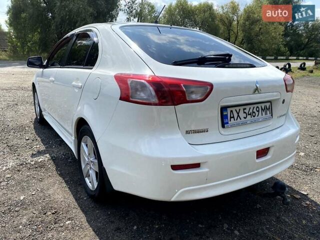 Білий Міцубісі Lancer, об'ємом двигуна 1.8 л та пробігом 238 тис. км за 6000 $, фото 4 на Automoto.ua
