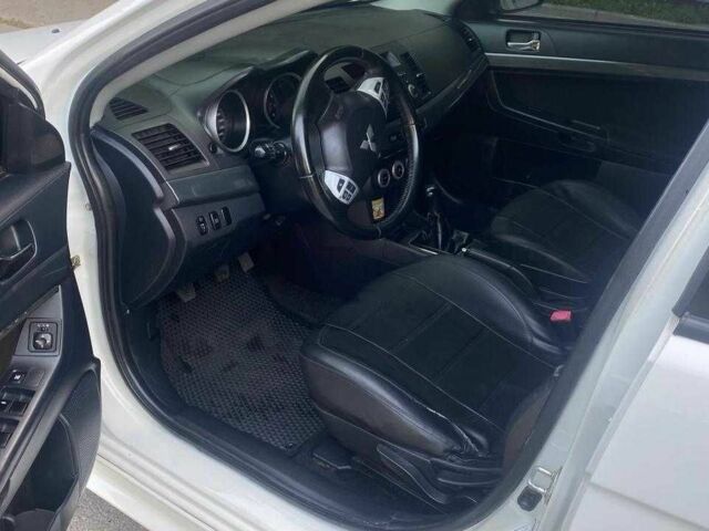 Білий Міцубісі Lancer, об'ємом двигуна 1.8 л та пробігом 230 тис. км за 6500 $, фото 6 на Automoto.ua