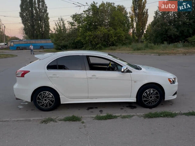 Белый Мицубиси Лансер, объемом двигателя 1.8 л и пробегом 230 тыс. км за 6500 $, фото 6 на Automoto.ua