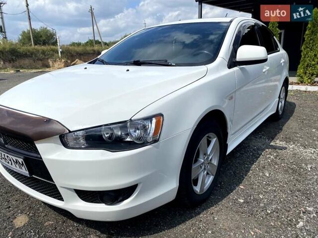 Білий Міцубісі Lancer, об'ємом двигуна 1.8 л та пробігом 238 тис. км за 6000 $, фото 2 на Automoto.ua