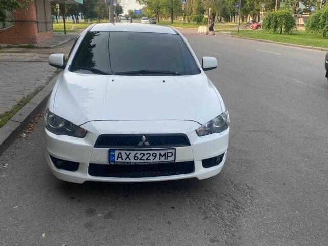 Білий Міцубісі Lancer, об'ємом двигуна 1.8 л та пробігом 230 тис. км за 6500 $, фото 4 на Automoto.ua