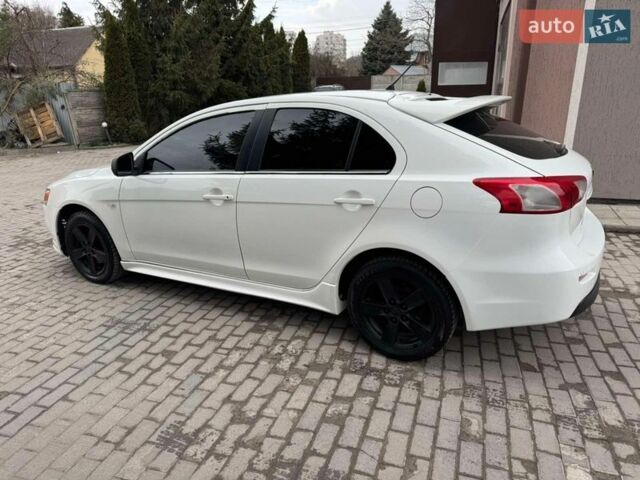 Белый Мицубиси Лансер, объемом двигателя 2 л и пробегом 230 тыс. км за 7300 $, фото 6 на Automoto.ua