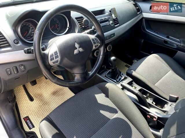 Білий Міцубісі Lancer, об'ємом двигуна 1.8 л та пробігом 238 тис. км за 6000 $, фото 9 на Automoto.ua