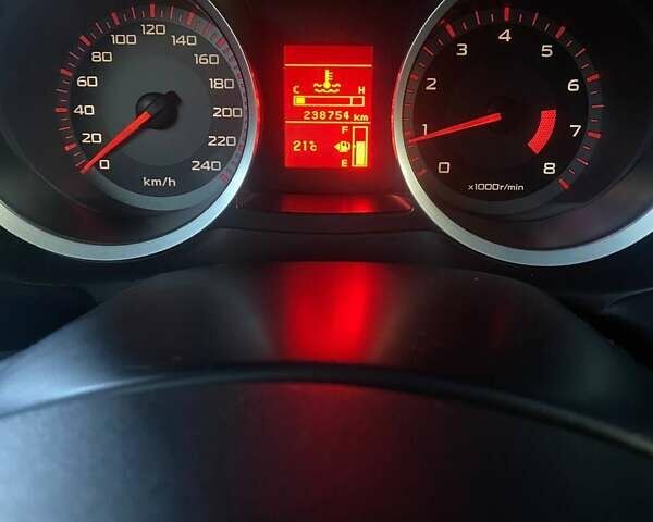Білий Міцубісі Lancer, об'ємом двигуна 1.8 л та пробігом 238 тис. км за 6000 $, фото 17 на Automoto.ua