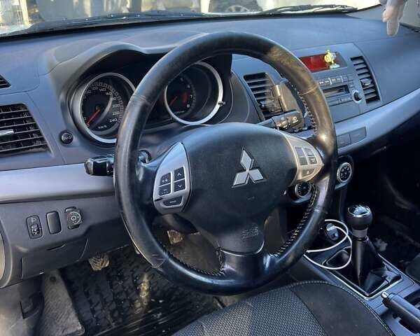 Білий Міцубісі Lancer, об'ємом двигуна 1.8 л та пробігом 225 тис. км за 5000 $, фото 15 на Automoto.ua