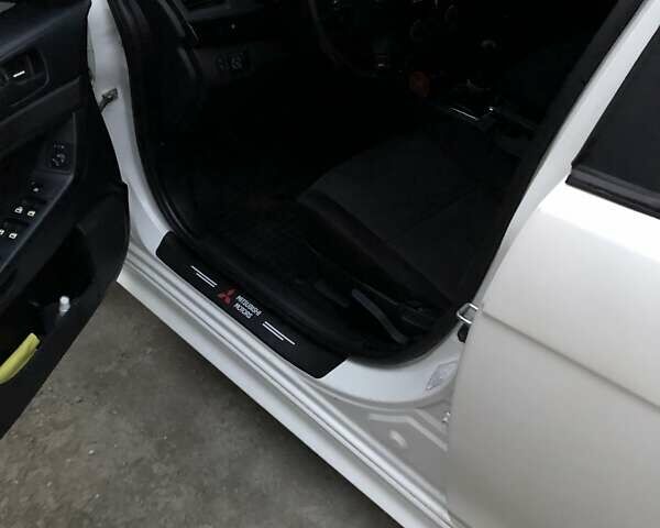 Белый Мицубиси Лансер, объемом двигателя 1.8 л и пробегом 215 тыс. км за 7000 $, фото 14 на Automoto.ua