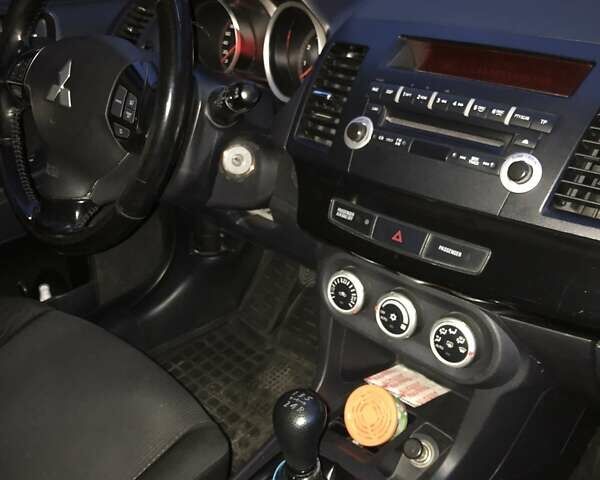 Белый Мицубиси Лансер, объемом двигателя 1.8 л и пробегом 215 тыс. км за 7000 $, фото 9 на Automoto.ua