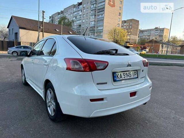 Білий Міцубісі Lancer, об'ємом двигуна 1.8 л та пробігом 262 тис. км за 6500 $, фото 19 на Automoto.ua