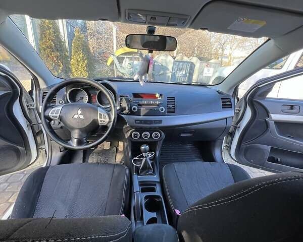 Білий Міцубісі Lancer, об'ємом двигуна 1.8 л та пробігом 225 тис. км за 5000 $, фото 13 на Automoto.ua