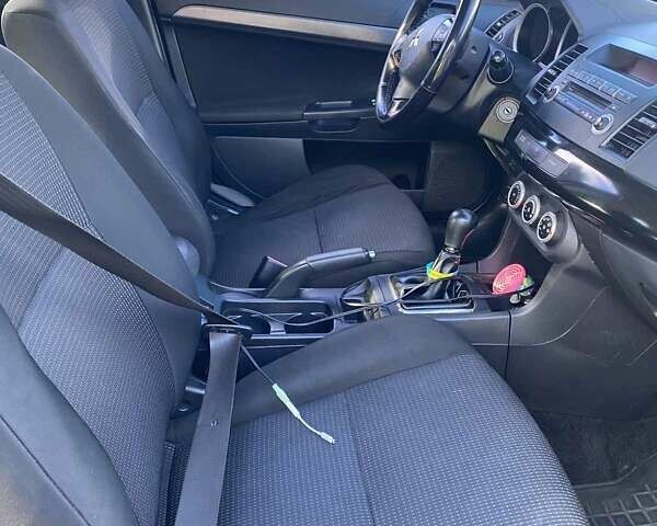 Белый Мицубиси Лансер, объемом двигателя 1.8 л и пробегом 215 тыс. км за 7000 $, фото 6 на Automoto.ua