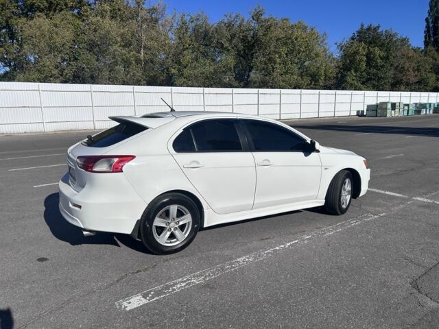 Белый Мицубиси Лансер, объемом двигателя 1.8 л и пробегом 160 тыс. км за 8500 $, фото 1 на Automoto.ua