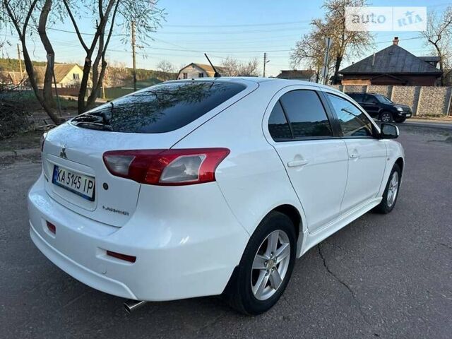 Білий Міцубісі Lancer, об'ємом двигуна 1.8 л та пробігом 262 тис. км за 6500 $, фото 14 на Automoto.ua