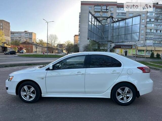 Білий Міцубісі Lancer, об'ємом двигуна 1.8 л та пробігом 262 тис. км за 6500 $, фото 22 на Automoto.ua