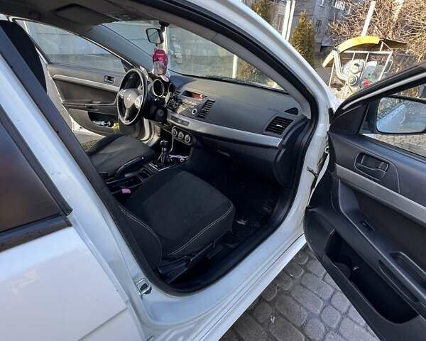 Білий Міцубісі Lancer, об'ємом двигуна 1.8 л та пробігом 225 тис. км за 5000 $, фото 11 на Automoto.ua