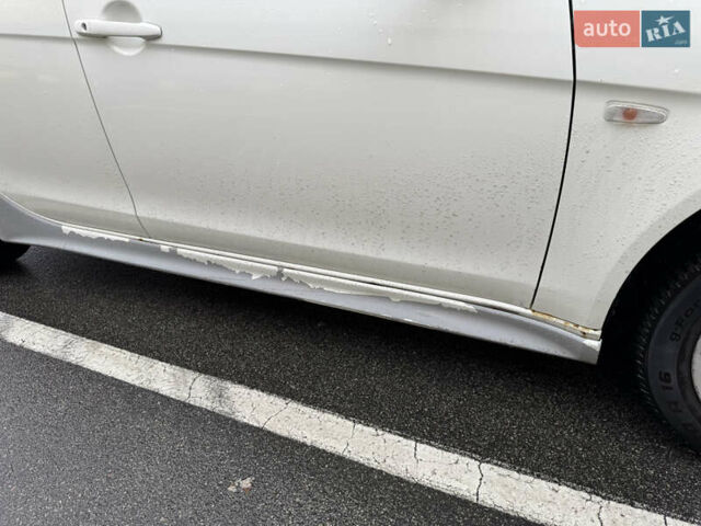 Белый Мицубиси Лансер, объемом двигателя 1.8 л и пробегом 258 тыс. км за 6100 $, фото 10 на Automoto.ua