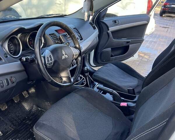 Білий Міцубісі Lancer, об'ємом двигуна 1.8 л та пробігом 225 тис. км за 5000 $, фото 16 на Automoto.ua