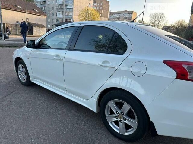 Білий Міцубісі Lancer, об'ємом двигуна 1.8 л та пробігом 262 тис. км за 6500 $, фото 20 на Automoto.ua