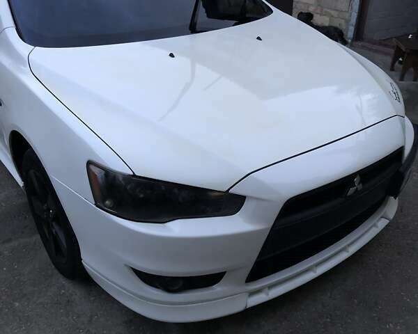 Белый Мицубиси Лансер, объемом двигателя 1.8 л и пробегом 215 тыс. км за 7000 $, фото 12 на Automoto.ua