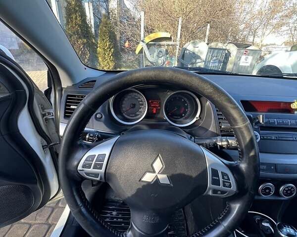 Білий Міцубісі Lancer, об'ємом двигуна 1.8 л та пробігом 225 тис. км за 5000 $, фото 9 на Automoto.ua