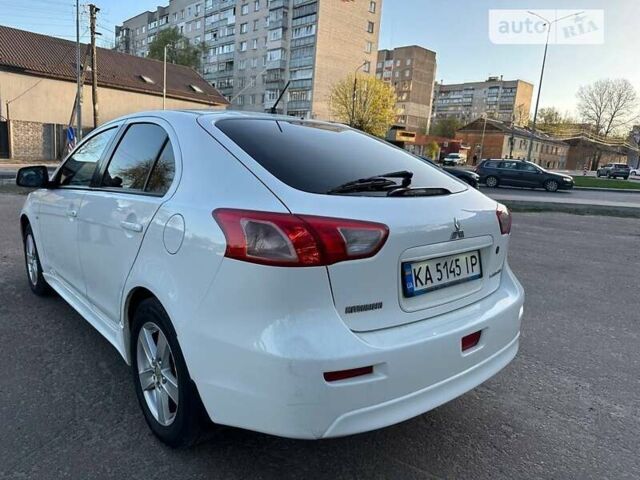 Білий Міцубісі Lancer, об'ємом двигуна 1.8 л та пробігом 262 тис. км за 6500 $, фото 18 на Automoto.ua