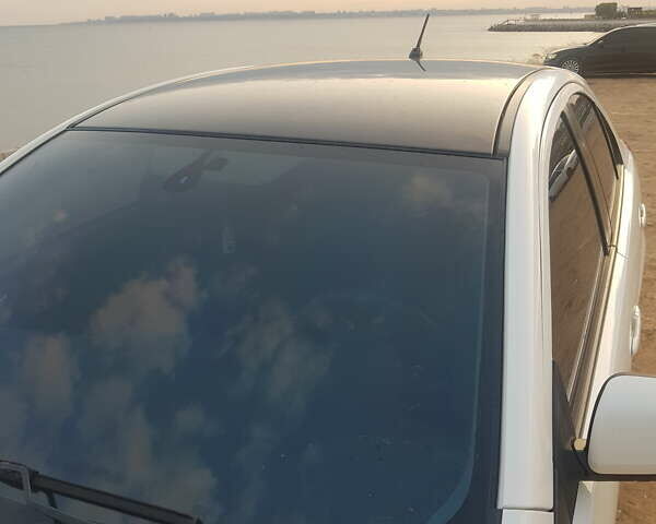 Білий Міцубісі Lancer, об'ємом двигуна 1.8 л та пробігом 122 тис. км за 8500 $, фото 16 на Automoto.ua