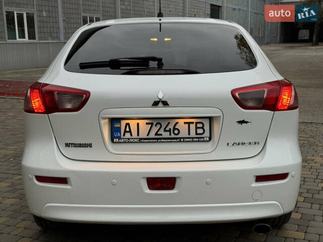 Мицубиси Лансер 2010 в Броварах на Automoto.ua Белый Мицубиси Лансер, объемом двигателя 1.8 л и пробегом 160 тыс. км за 7600 $, фото 10 на Automoto.ua