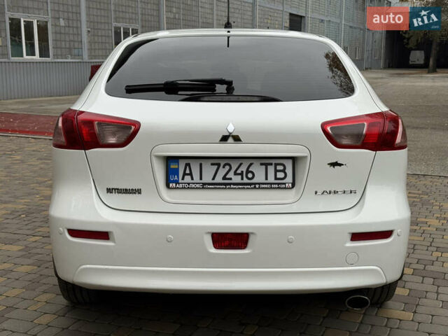Мицубиси Лансер 2010 в Броварах на Automoto.ua Белый Мицубиси Лансер, объемом двигателя 1.8 л и пробегом 160 тыс. км за 7600 $, фото 4 на Automoto.ua