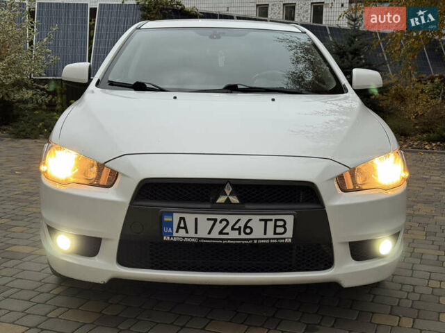 Мицубиси Лансер 2010 в Броварах на Automoto.ua Белый Мицубиси Лансер, объемом двигателя 1.8 л и пробегом 160 тыс. км за 7600 $, фото 9 на Automoto.ua