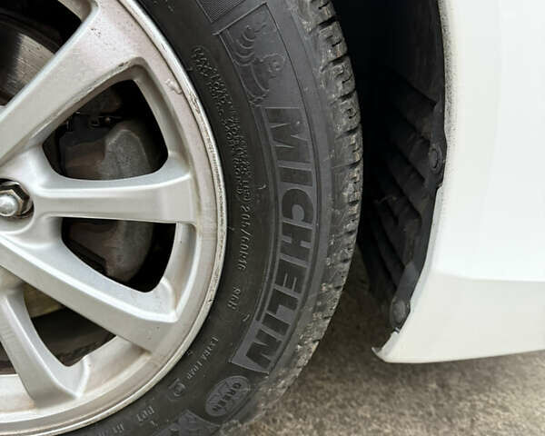 Белый Мицубиси Лансер, объемом двигателя 1.8 л и пробегом 151 тыс. км за 7350 $, фото 8 на Automoto.ua