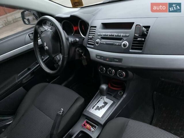 Белый Мицубиси Лансер, объемом двигателя 1.8 л и пробегом 214 тыс. км за 7000 $, фото 11 на Automoto.ua