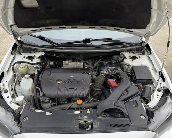 Мицубиси Лансер 2010 в Броварах на Automoto.ua Белый Мицубиси Лансер, объемом двигателя 1.8 л и пробегом 160 тыс. км за 7600 $, фото 12 на Automoto.ua