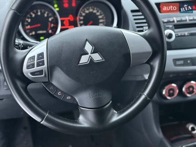 Белый Мицубиси Лансер, объемом двигателя 1.6 л и пробегом 225 тыс. км за 6250 $, фото 30 на Automoto.ua