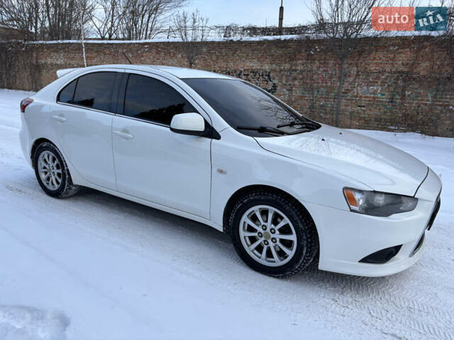 Білий Міцубісі Lancer, об'ємом двигуна 1.8 л та пробігом 173 тис. км за 6200 $, фото 12 на Automoto.ua