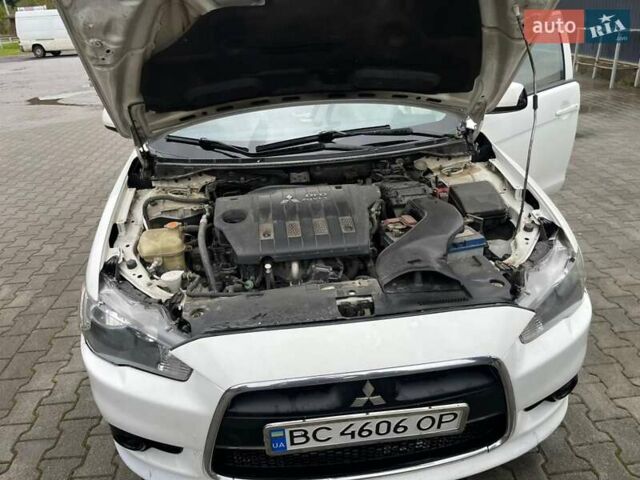 Белый Мицубиси Лансер, объемом двигателя 1.8 л и пробегом 258 тыс. км за 6500 $, фото 4 на Automoto.ua