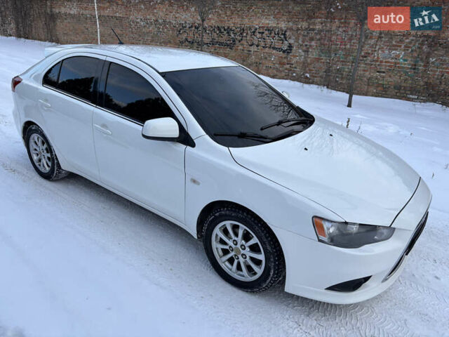 Білий Міцубісі Lancer, об'ємом двигуна 1.8 л та пробігом 173 тис. км за 6200 $, фото 14 на Automoto.ua
