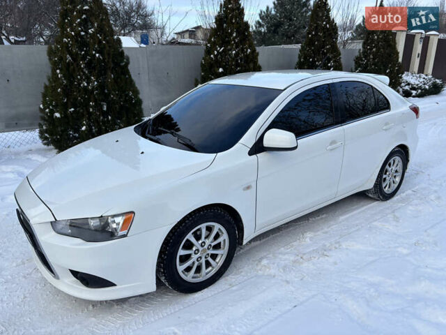 Білий Міцубісі Lancer, об'ємом двигуна 1.8 л та пробігом 173 тис. км за 6200 $, фото 49 на Automoto.ua