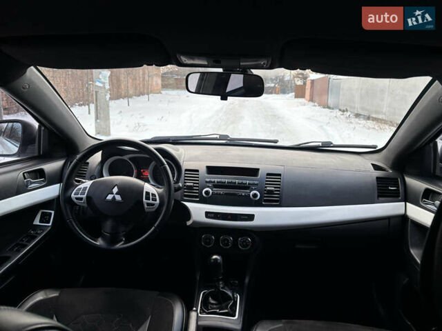 Білий Міцубісі Lancer, об'ємом двигуна 1.8 л та пробігом 173 тис. км за 6200 $, фото 41 на Automoto.ua