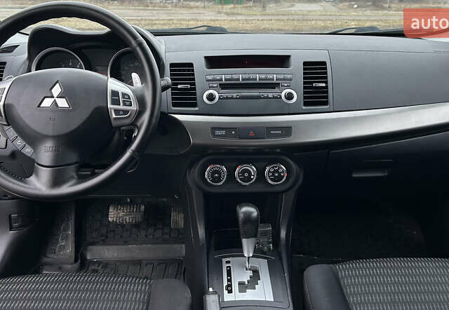 Белый Мицубиси Лансер, объемом двигателя 1.8 л и пробегом 128 тыс. км за 8200 $, фото 18 на Automoto.ua